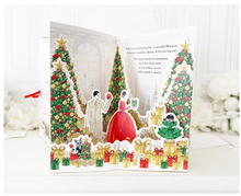 Load image into Gallery viewer, Claris’s Christmas Carousel: Holiday Heist Special Pop-up Edition - Megan Hess
